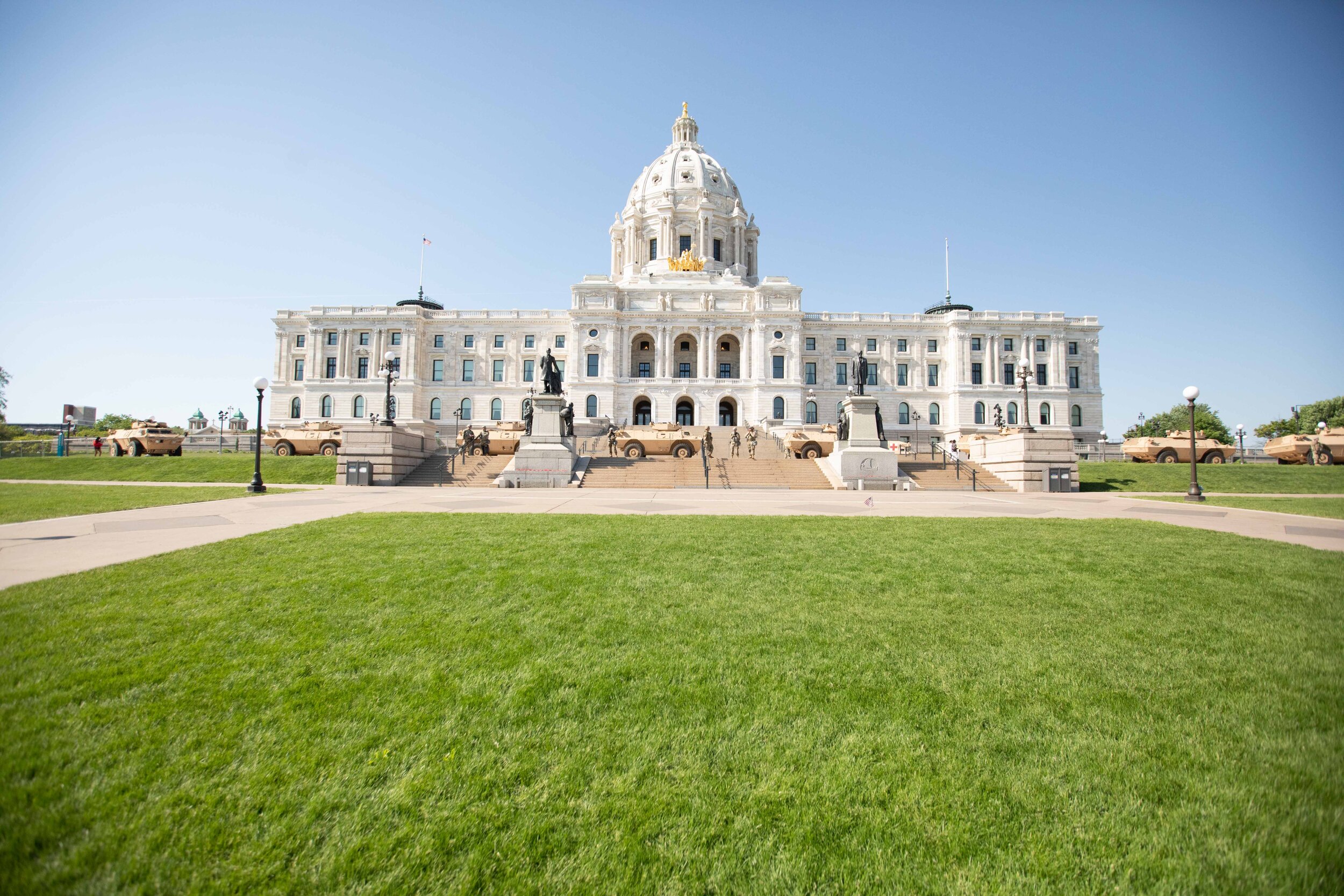 The lawn of the Minnesota State Capitol sits empty as the National Guard set up armored vehicles and soldiers on the steps of the Captiol building in Saint Paul, Minnesota on June 1, 2020. Chris Juhn/Zenger 