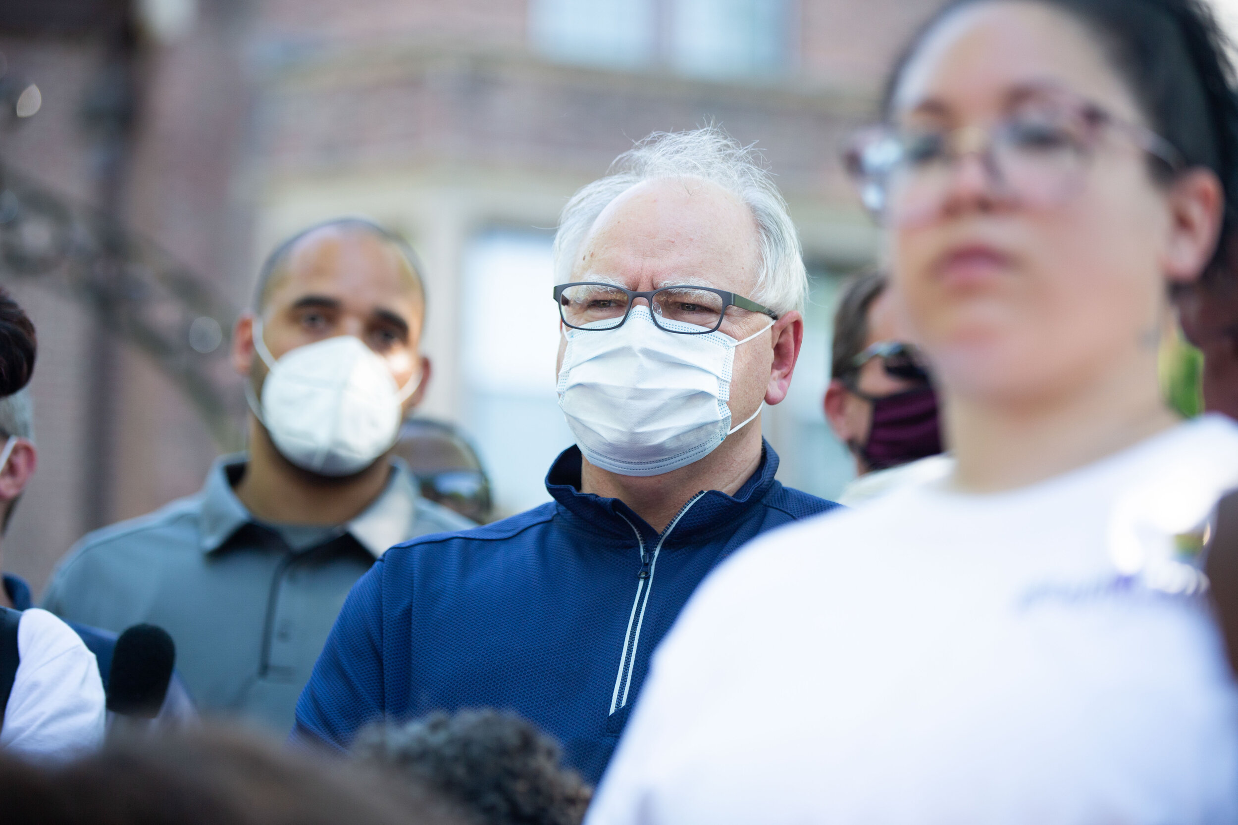  Governor Tim Walz stands behind the people that were speaking at a protest over the police killing of George Floyd in front of the Governors Mansion in Saint Paul, Minnesota on June 1, 2020. Chris Juhn/Zenger 