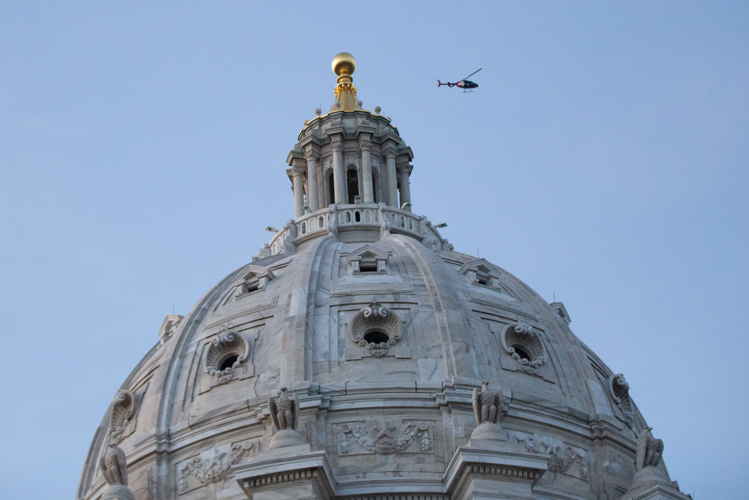  A news chopper flies over the Minnesota State Capitol building in Saint Paul during a protest over the police killing of George Floyd on June 1, 2020. Chris Juhn/Zenger 