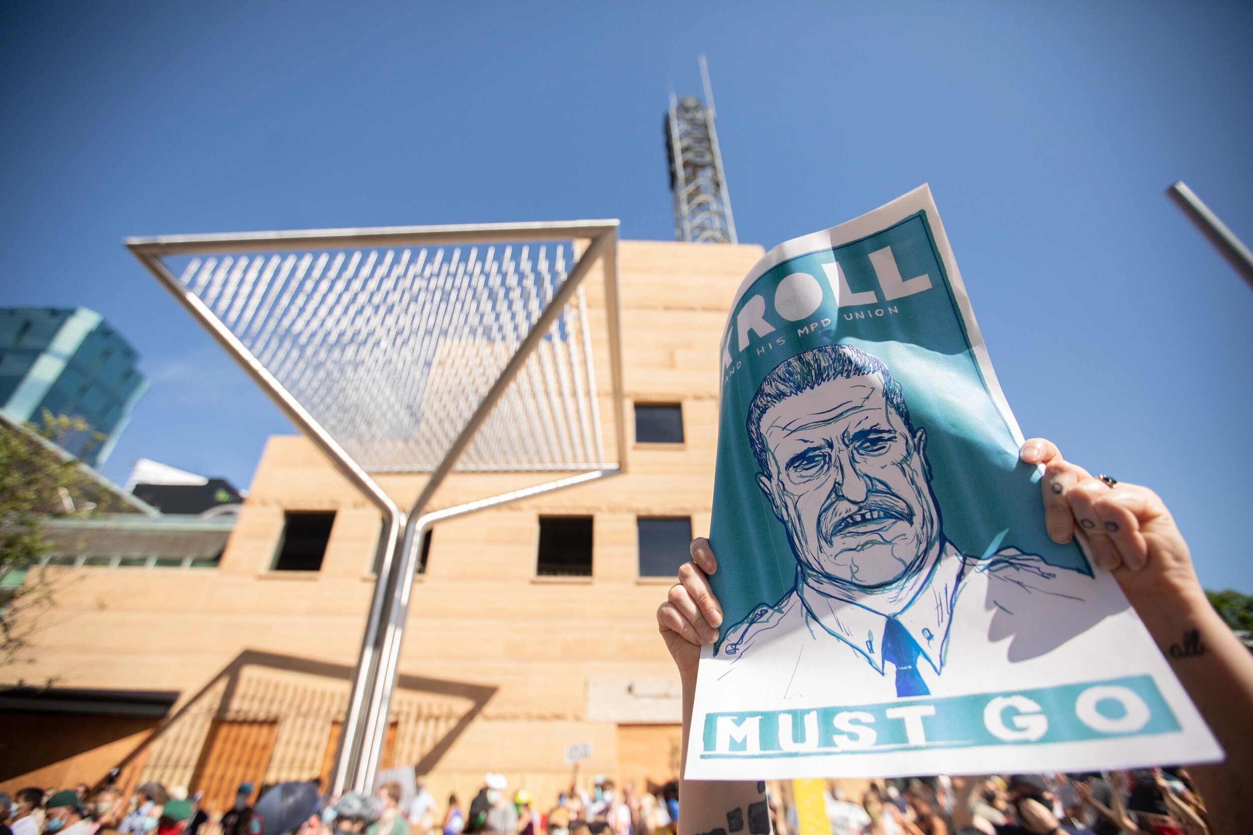  A "Bob Kroll Must Go" sign is held up in front of the WCCO building in Minneapolis, Minnesota at a protest demanding that Liz Collin be fired from the station. The Television anchor is married to Bob Kroll,  the president of the Police Officers Fede