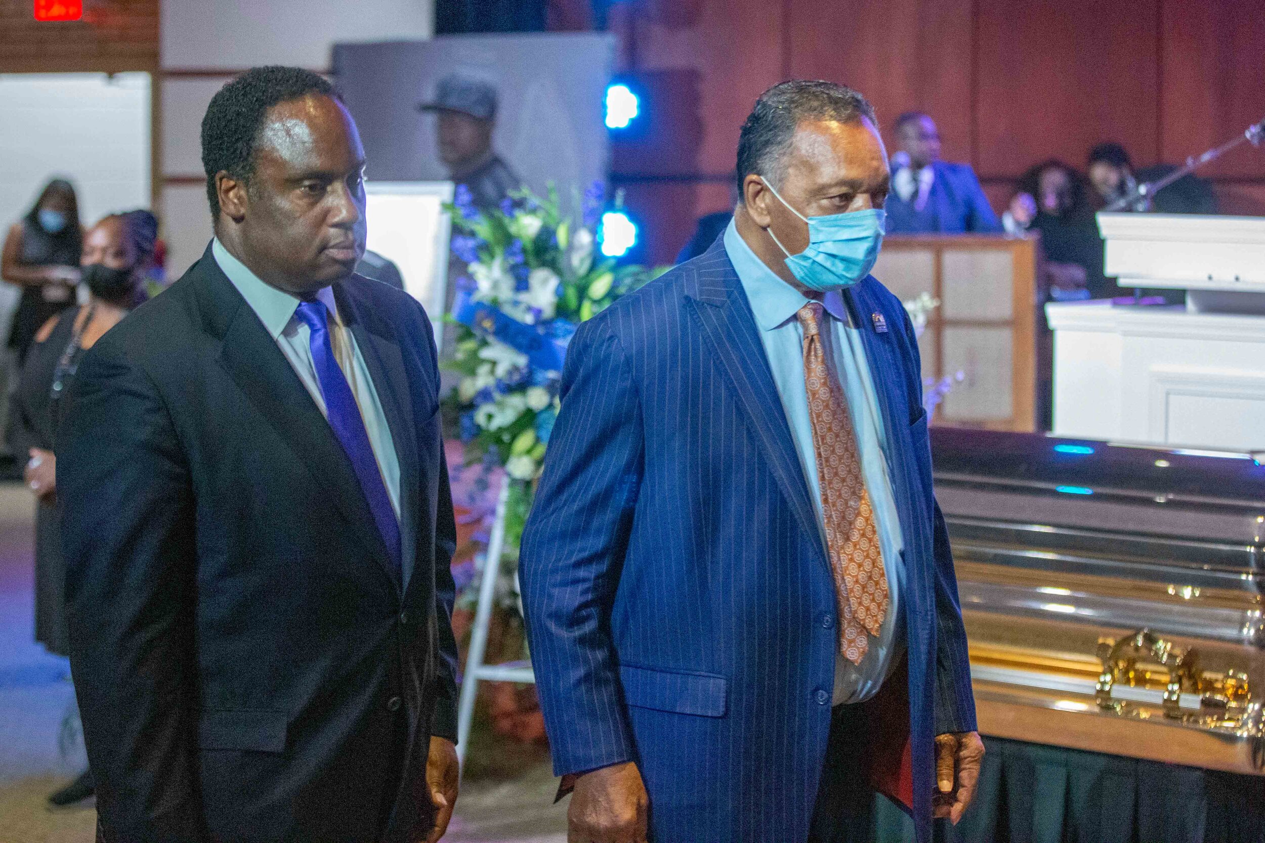  Rev. Jesse Jackson (right) and his son Jonathan Jackson take their seat at the memorial for George Floyd at North Central University in Minneapolis, Minnesota on Jun 4, 2020. 