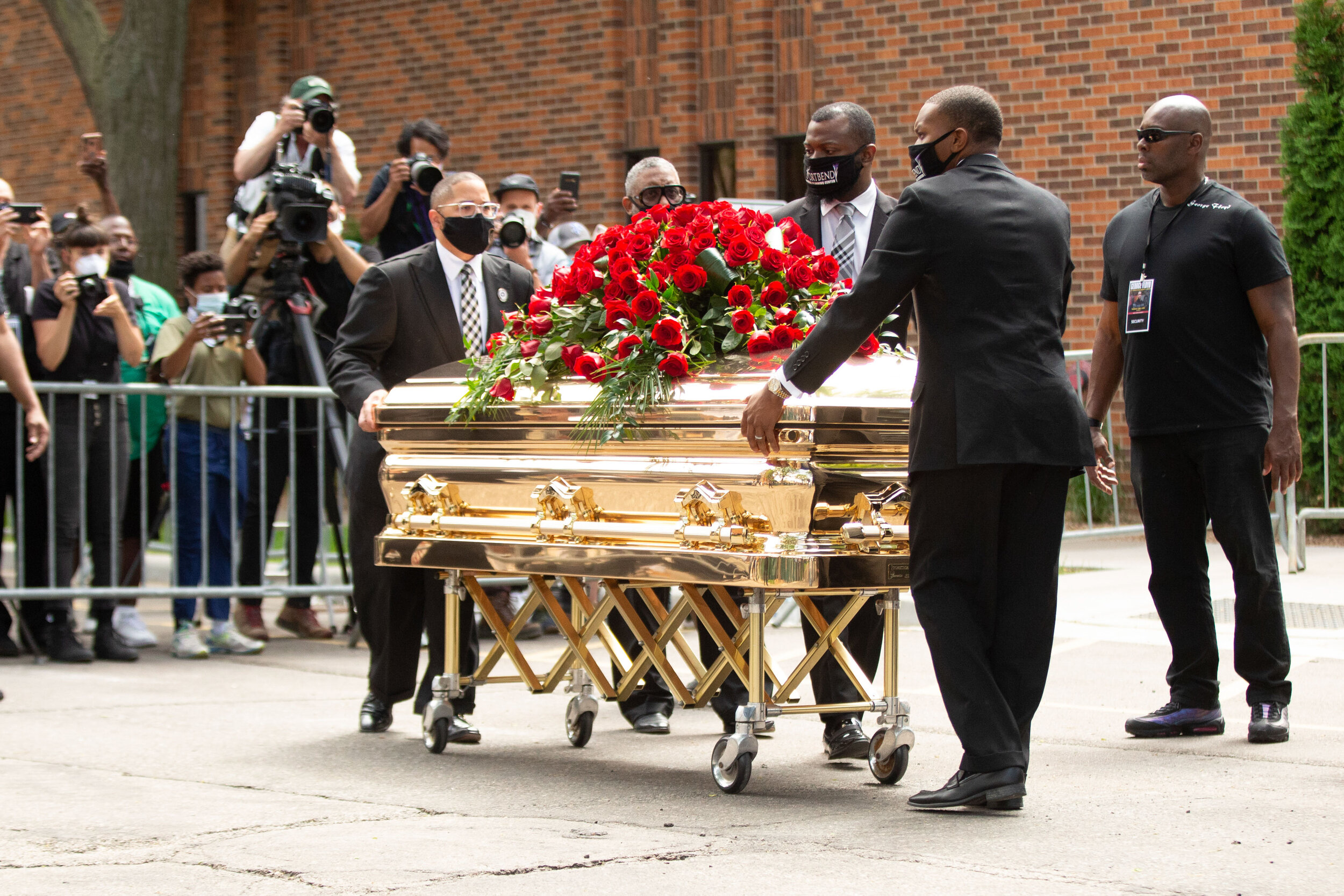  The casket of George Floyd gets rolled out of North Central University and put into a hearse at the memorial for George in Minneapolis, Minnesota on Jun 4, 2020. 