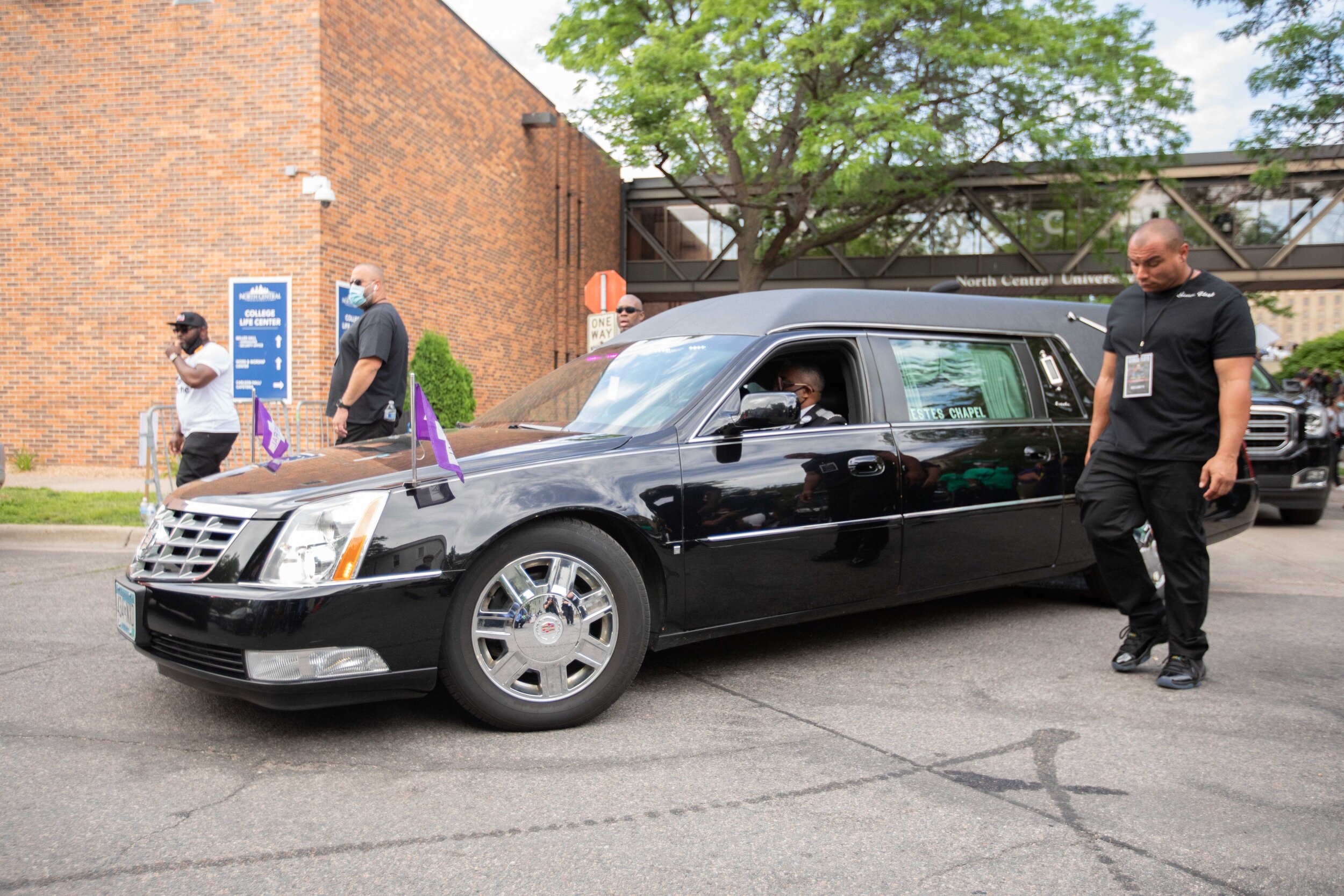  After having the casket put into the back of a hearse, it moves to the street where it leaves the grounds of North Central University in Minneapolis, Minnesota on Jun 4, 2020. 