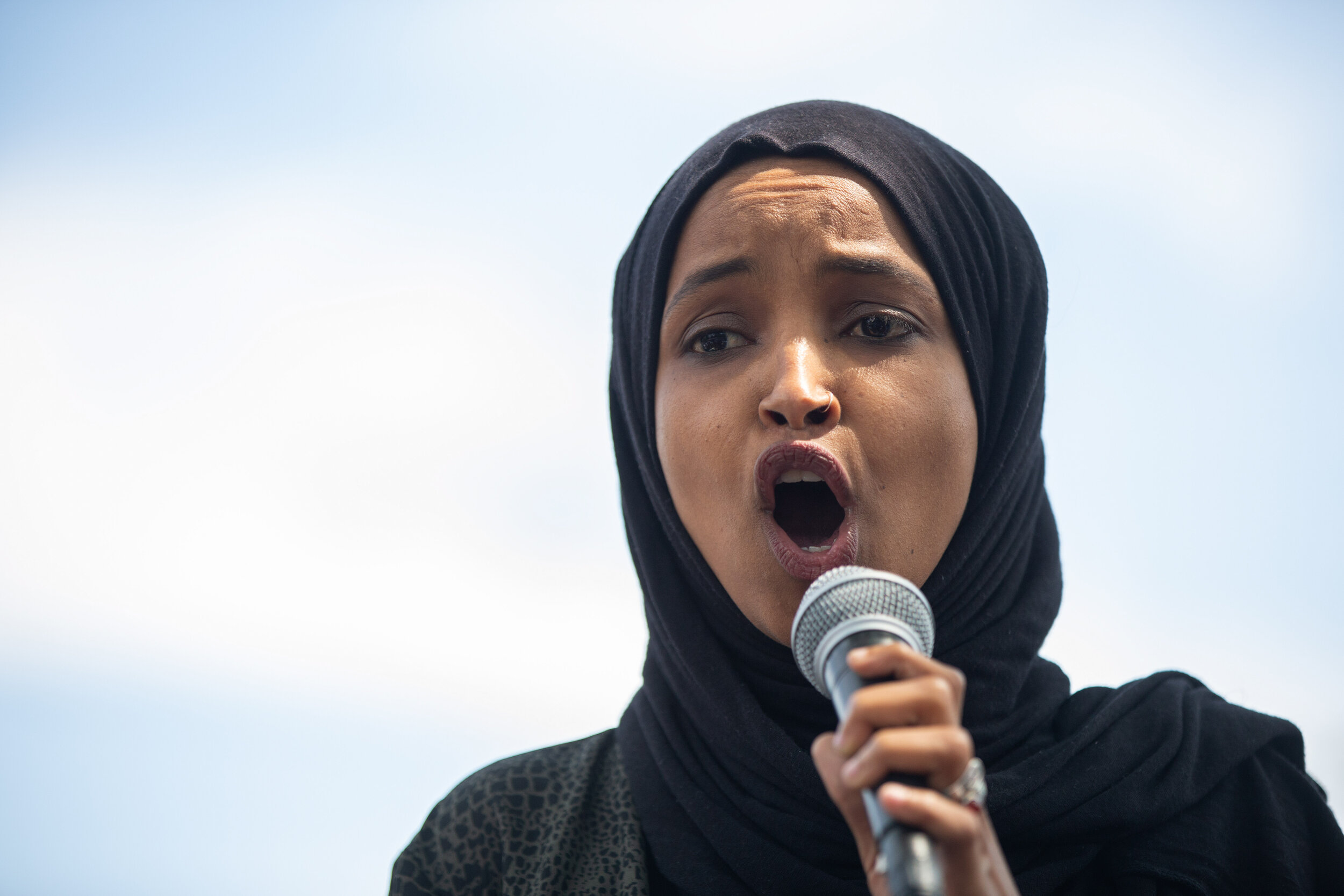  Congresswomen Ilhan Omar speaks to the crowd of protesters that are demanding the defuding of the Minneapolis Police Department at Bottineau Field in Minneapolis, Minnesota on Jun 6, 2020. 