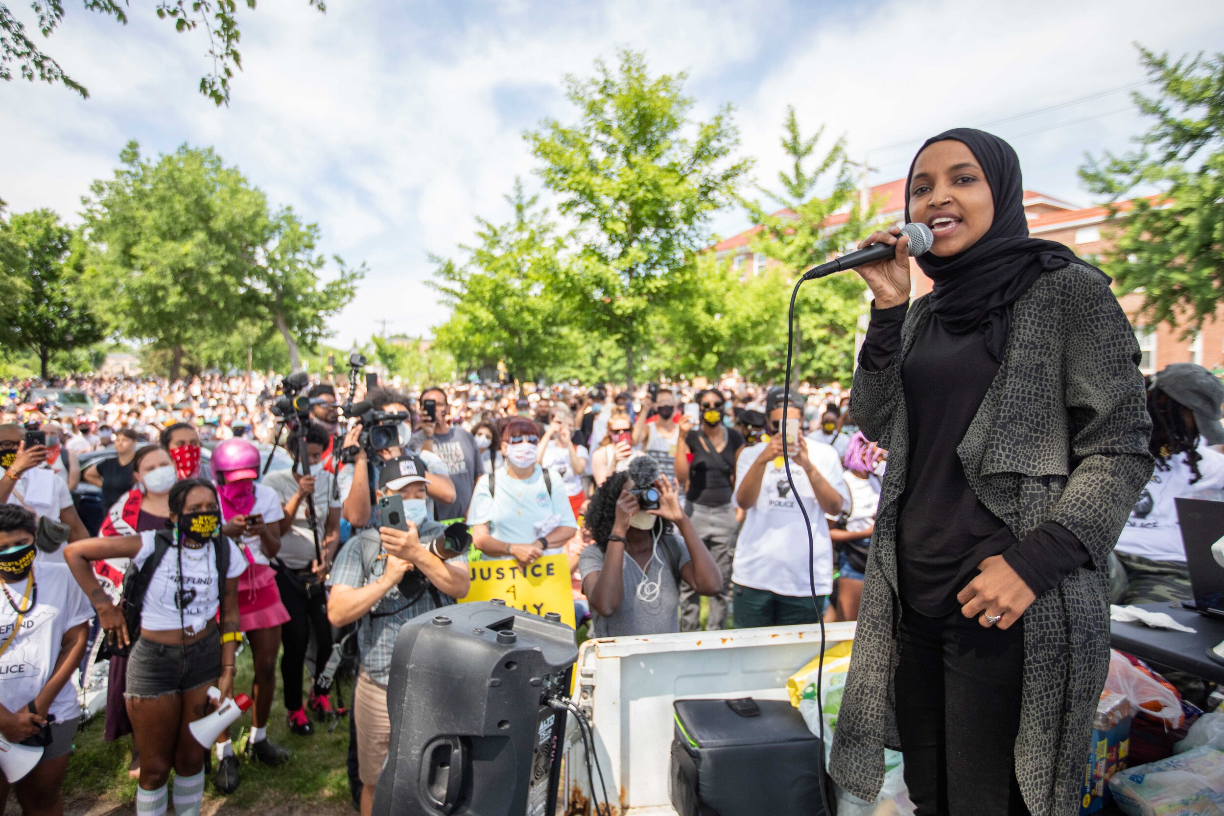  Congresswomen Ilhan Omar speaks to the crowd of protesters that are demanding the defuding of the Minneapolis Police Department at Bottineau Field in Minneapolis, Minnesota on Jun 6, 2020. 