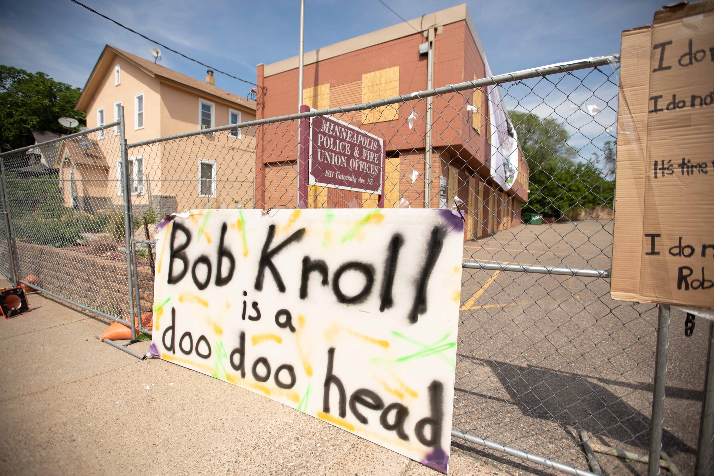  Covered with signs and a banner, a board calling Police Union President Bob Kroll a "doo doo head," was put on the fence around the Minneapolis Police and Fire Union offices in Minneapolis, Minnesota on Jun 6, 2020. 