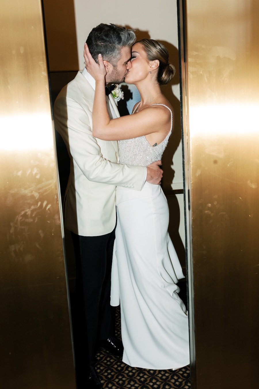 Emotional candid moment between bride and groom at the wedding in Farmington Polo Club