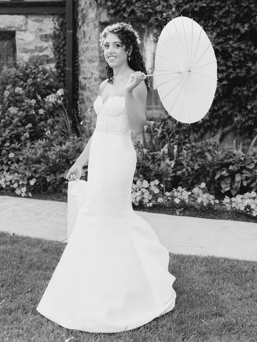 glamour bride with umbrella portrait at Saint Clements Castle