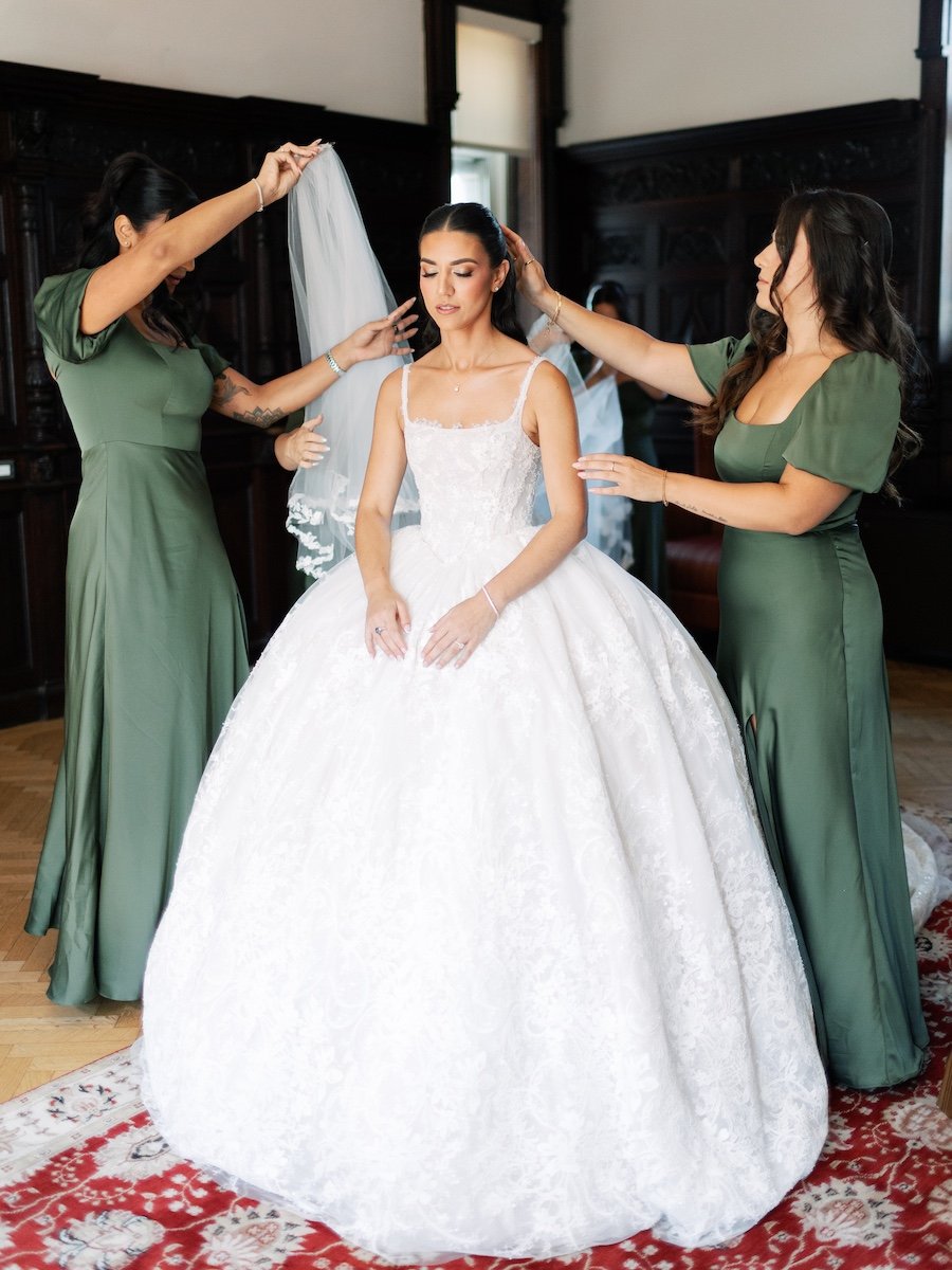 bride getting ready at branford house.jpg