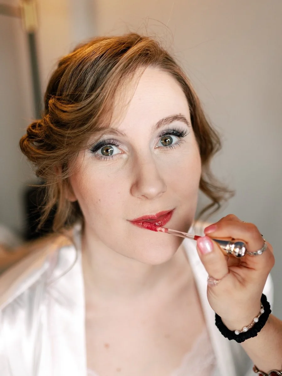 Bride Karleigh getting ready for vintage themed Pond House Cafe wedding in Connecticut