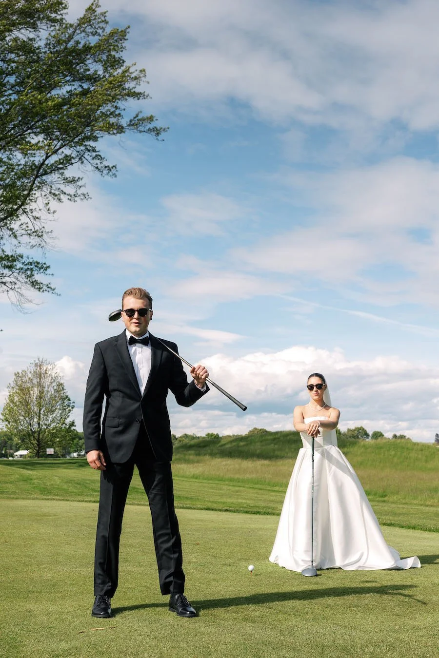 Glamour vibe at the TPC River Highlands bride and groom playing golfportraits