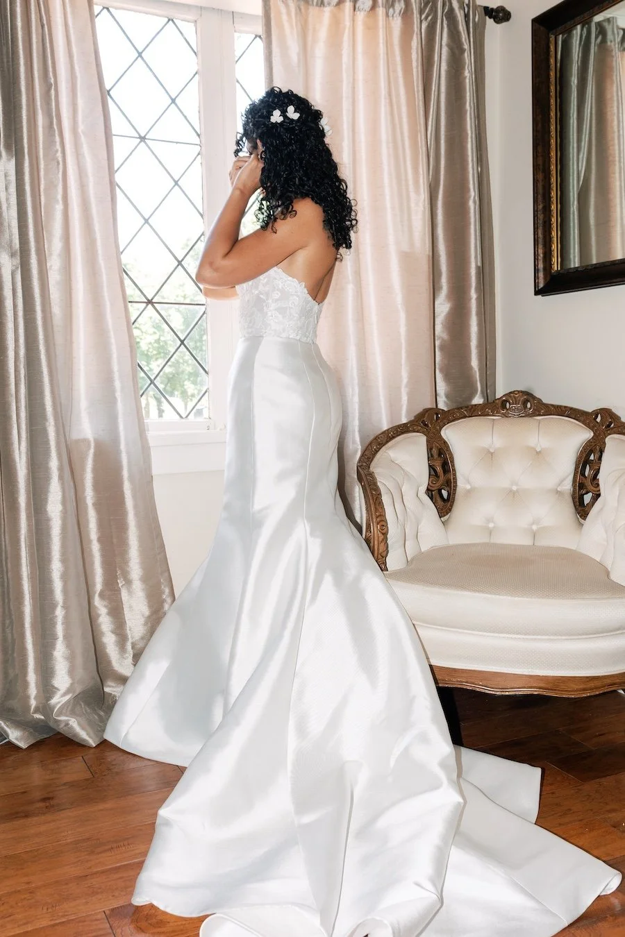 bride getting dressed for wedding ceremony at Saint Clements Castle, Connecticut