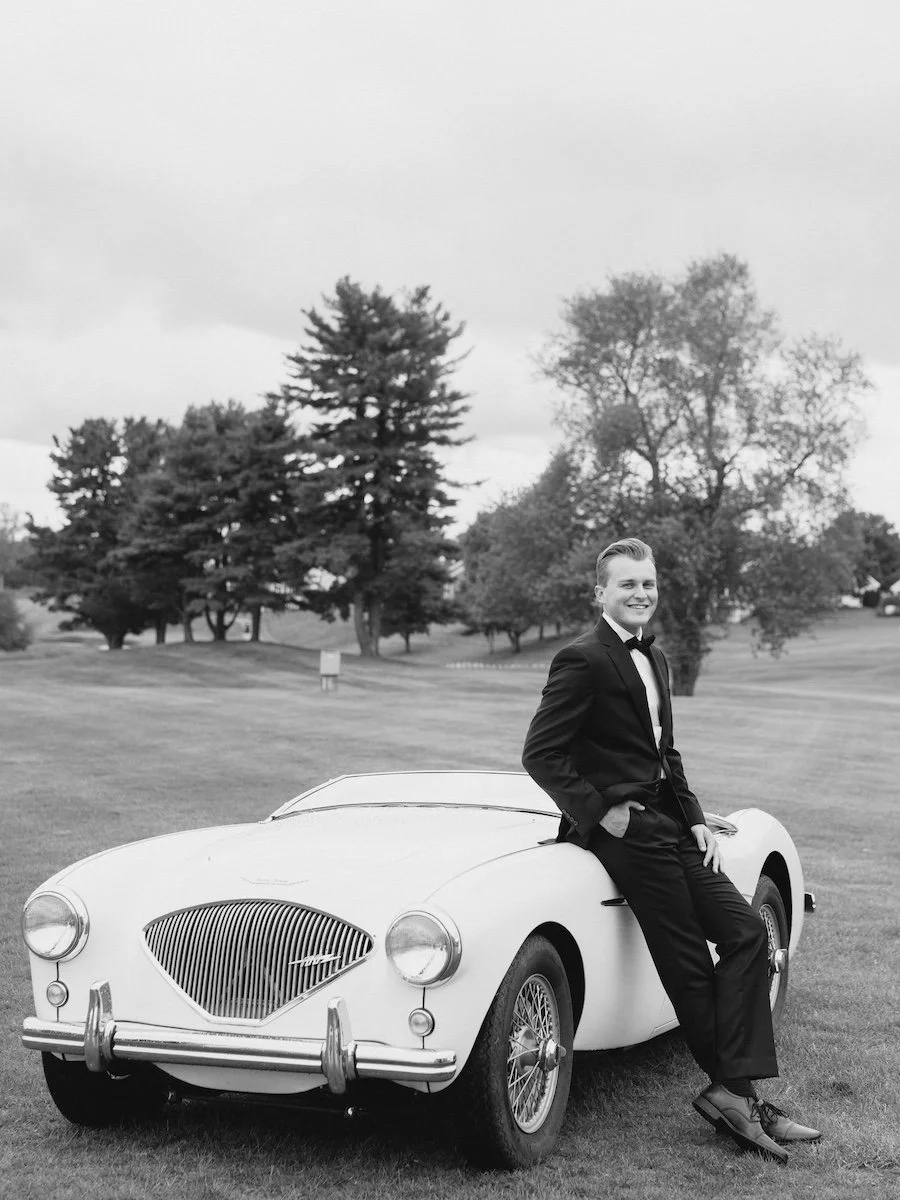 Elegant Groom portrait with classic vintage gar at the TPC River Golf Club in Cromwell