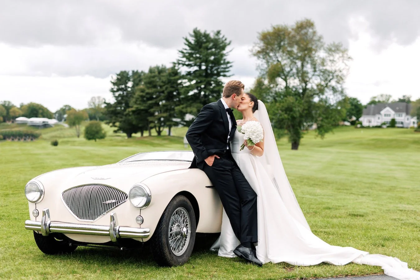 Classic vintage wedding car at TPC River Highlands wedding, elegant detail and style