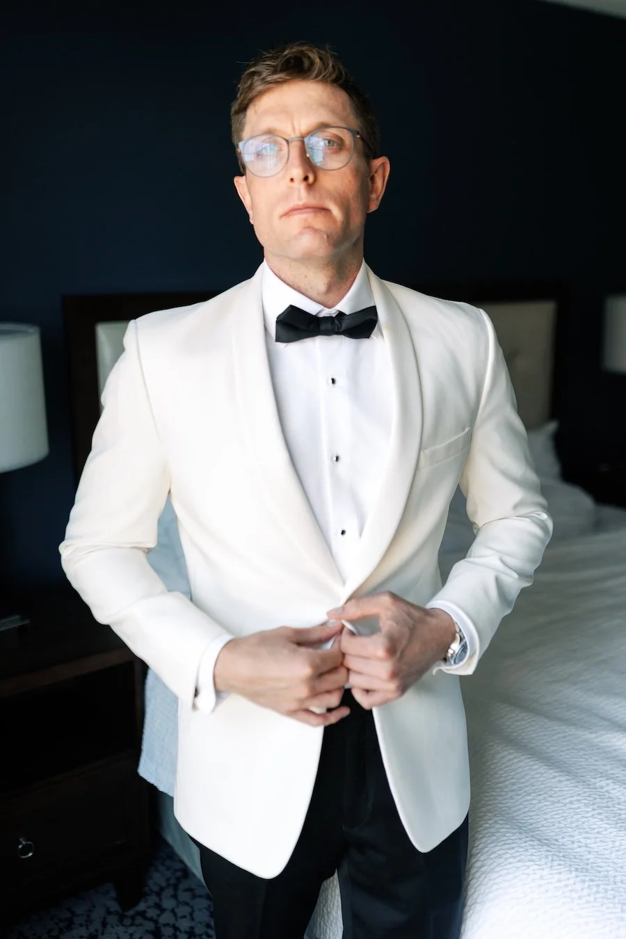 Groom getting ready before wedding at Saint Clements Castle wedding in Connecticut