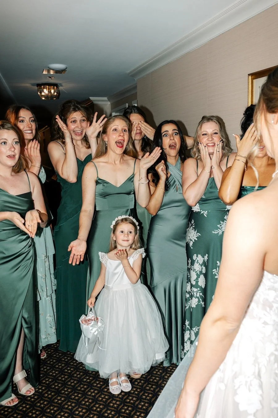 Camilla doing First Look with bridesmaids at the Avon Old Farms Hotel, CT