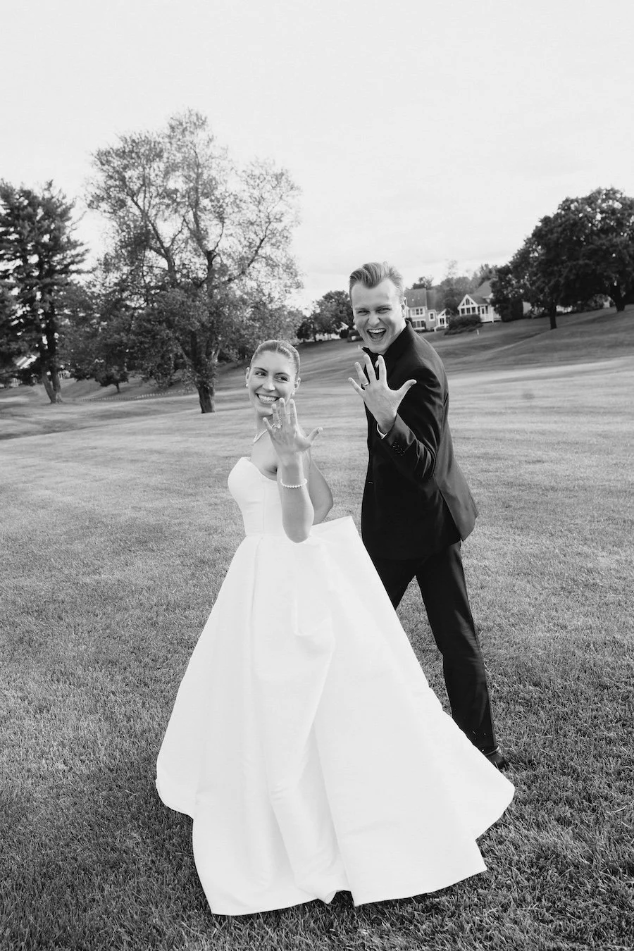 Classic and elegant sunset portraits at TPC River Highlands wedding