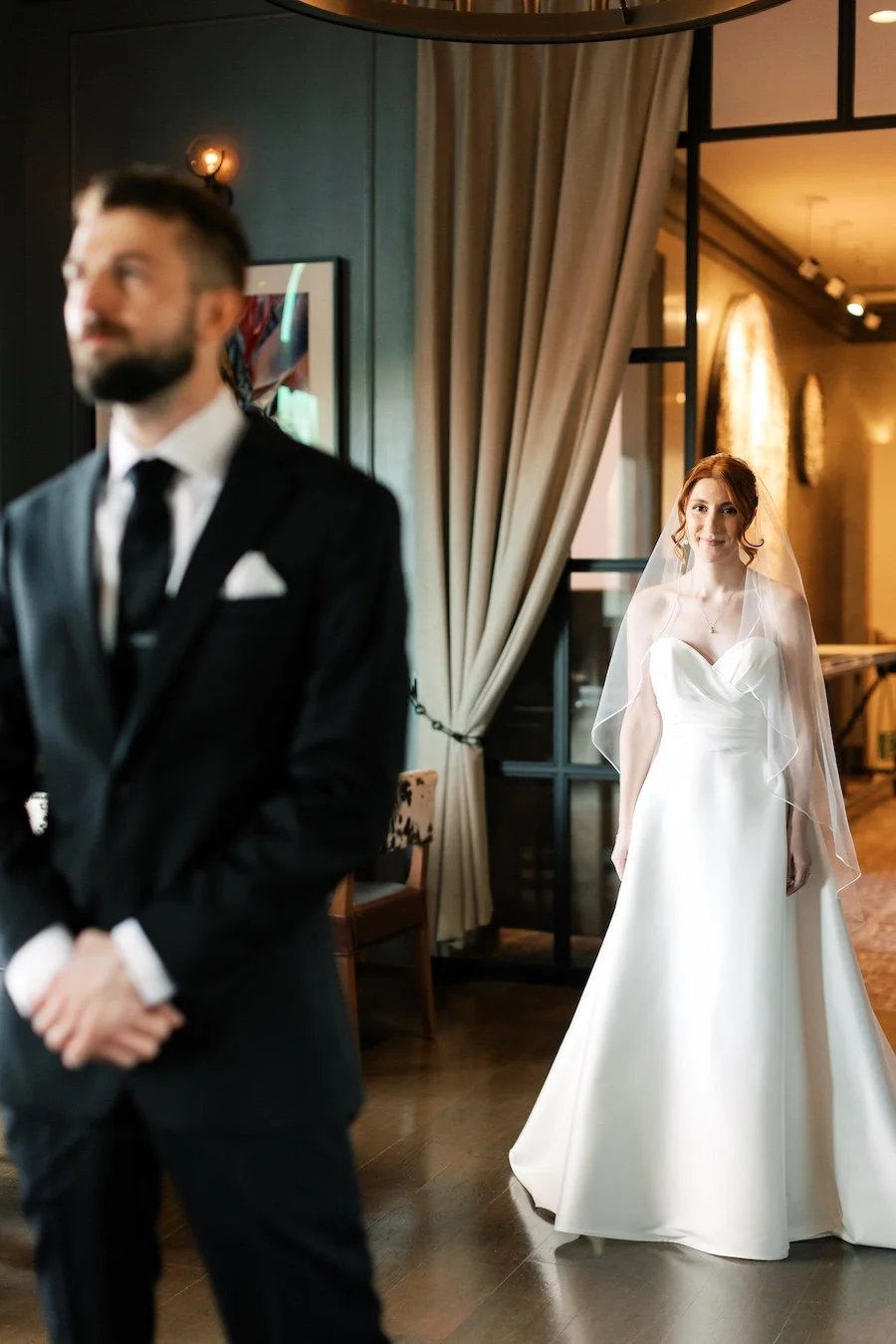 First look moment of bride and groom at Delamar West Hartford wedding