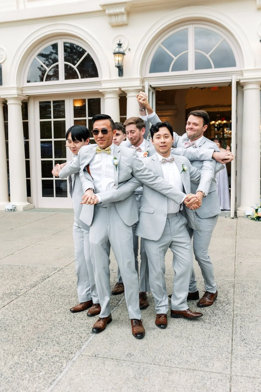 Epic fun groomsmen entrance at Wadsworth Mansion wedding reception