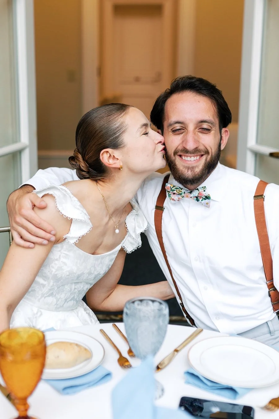 Private wedding dinner for bride and groom at the bacony patio of Wadsworth Mansion with sunset view