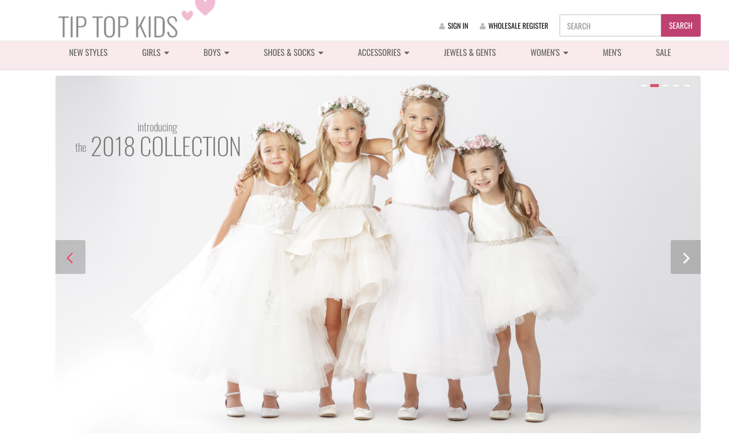 four young girls in white flower girl dresses by Tip Top Kids