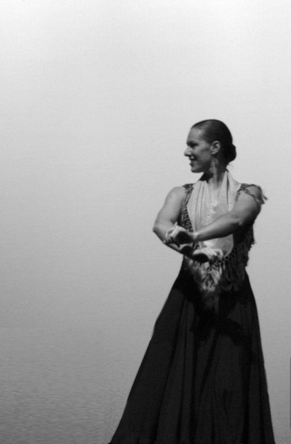 My husband shot this picture of me the very first time I performed on stage in Denver. It was a fun choreography to el maestro (may he rest in peace) Paco de Lucia: Entre dos aguas. I loved this shot because I was so conscious of keeping my arms in position con aire .