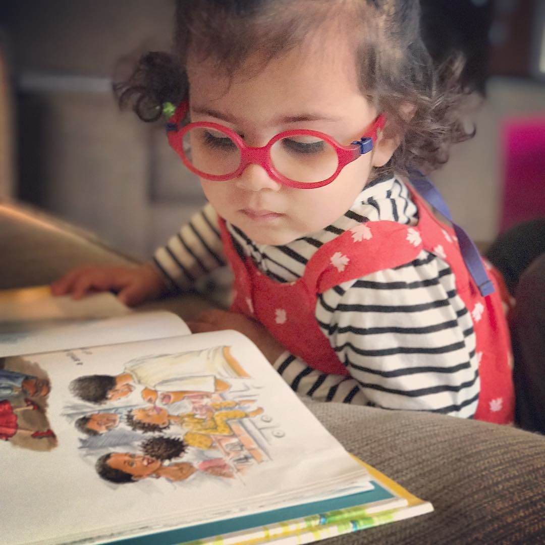 Loves_to_read__Will_soon_pass_Daddy_s_reading_comprehension_levels...__bookscheckemout.jpg