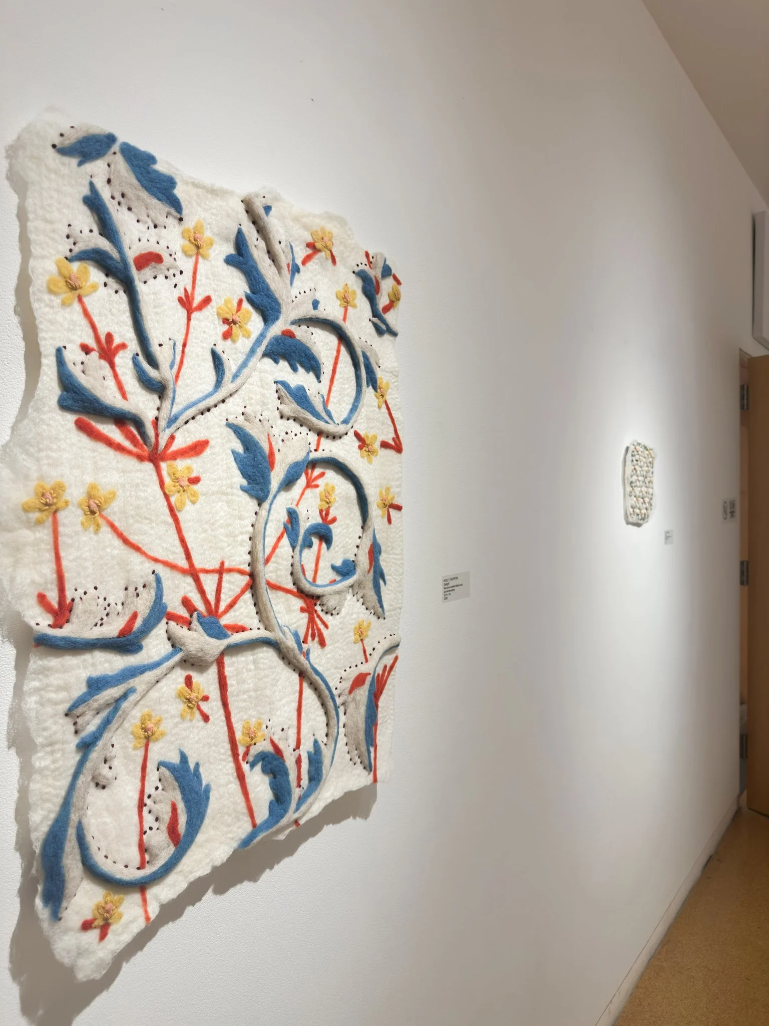 Delight, wool felt with wool embroidery, 33”h x 25.5”w x 1”d