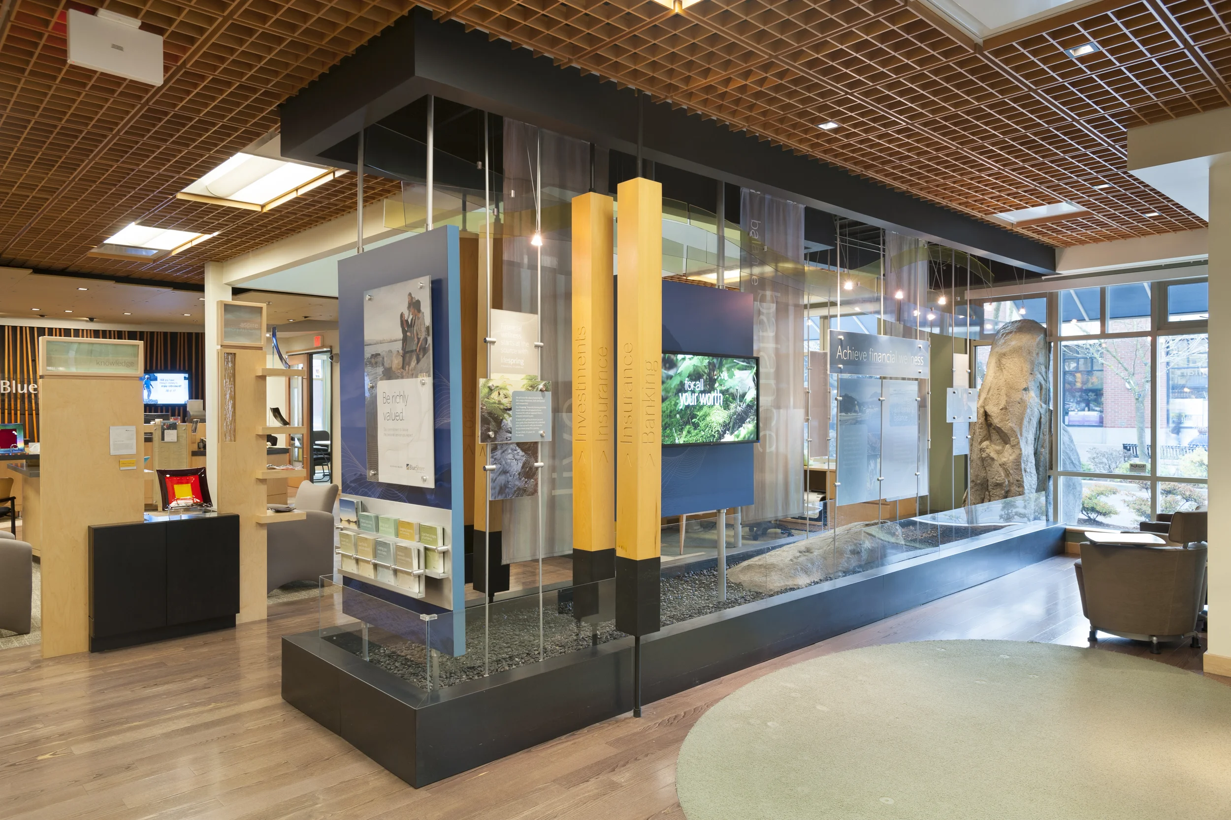  Staging engagement and interactions begins at the Discovery Wall which links wifi access, digital messaging and informational exploration of financial wellness. 