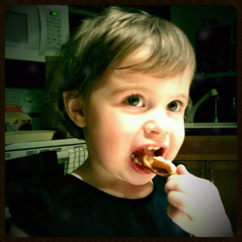 ellie eating pizza.jpg