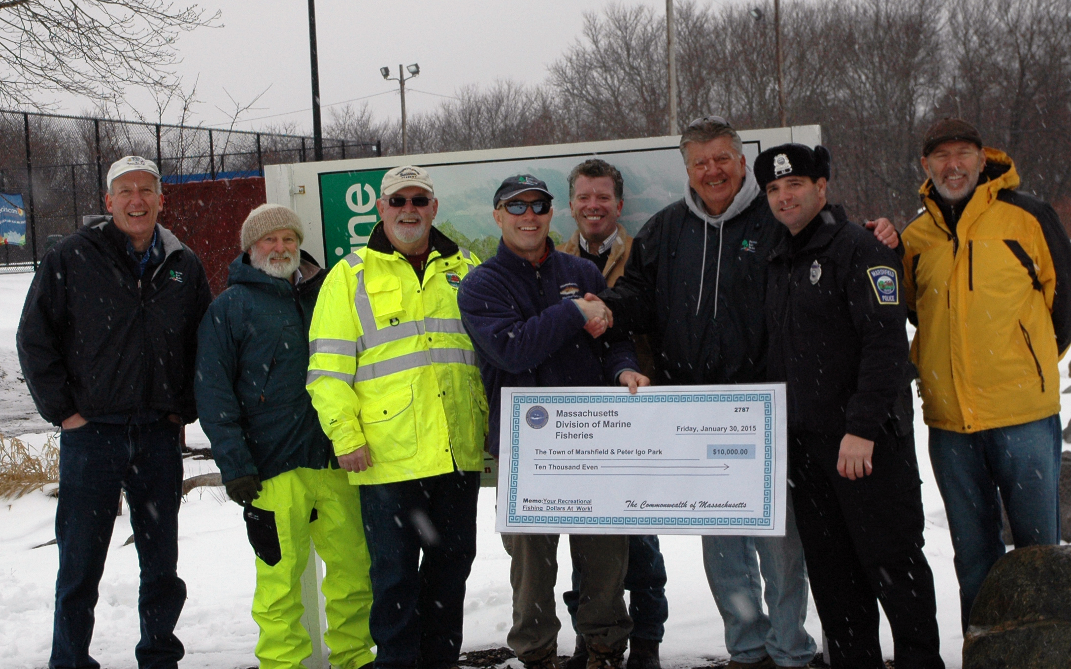 From left to right: Russ Ellis, Jay Wennemer (Town Conservation Agent), Tom Reynolds (DPW Superintendent), Ross Kessler (Mass. Division of Fisheries), Craig Alvey, Bud Duksta, Mike Dimeo (Marshfield Harbormaster) , & Gary Covitz on a cold snowy Friday afternoon at Peter Igo Park.