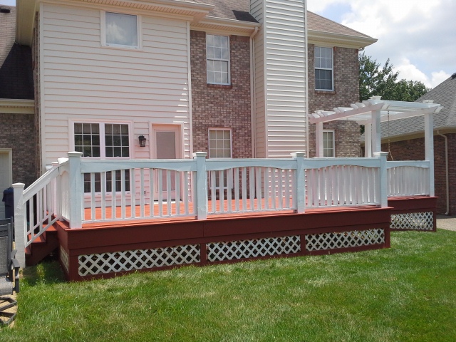 Side view of completed deck with lattice and trellis swing.