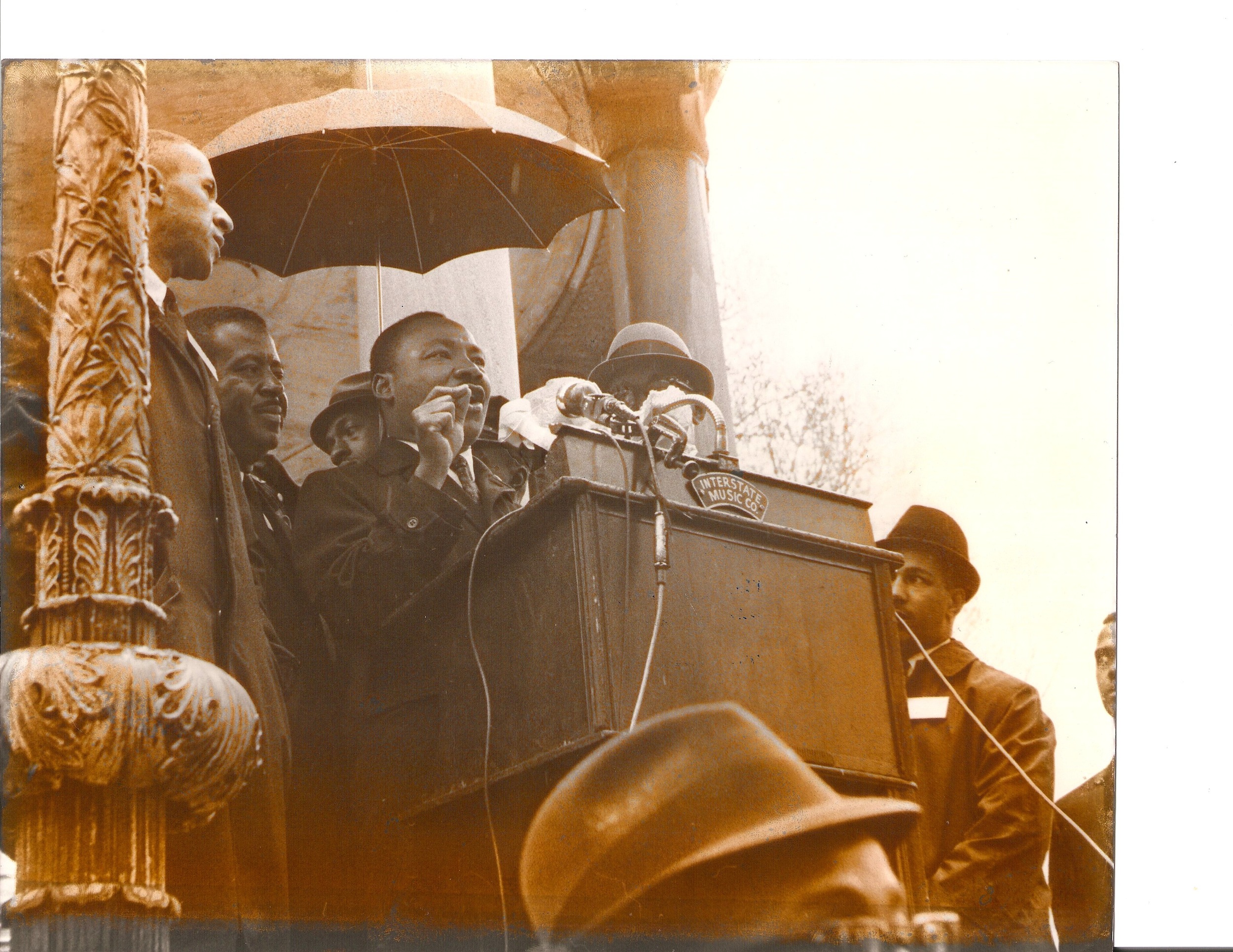 This picture is of Martin Luther King, Jr. giving a speech during the march to City Hall in Boston Massachusetts. He is speaking at the Bandstand on the Boston Common. MYTOWN Archive photo credits to Beresford St. C. Corbin