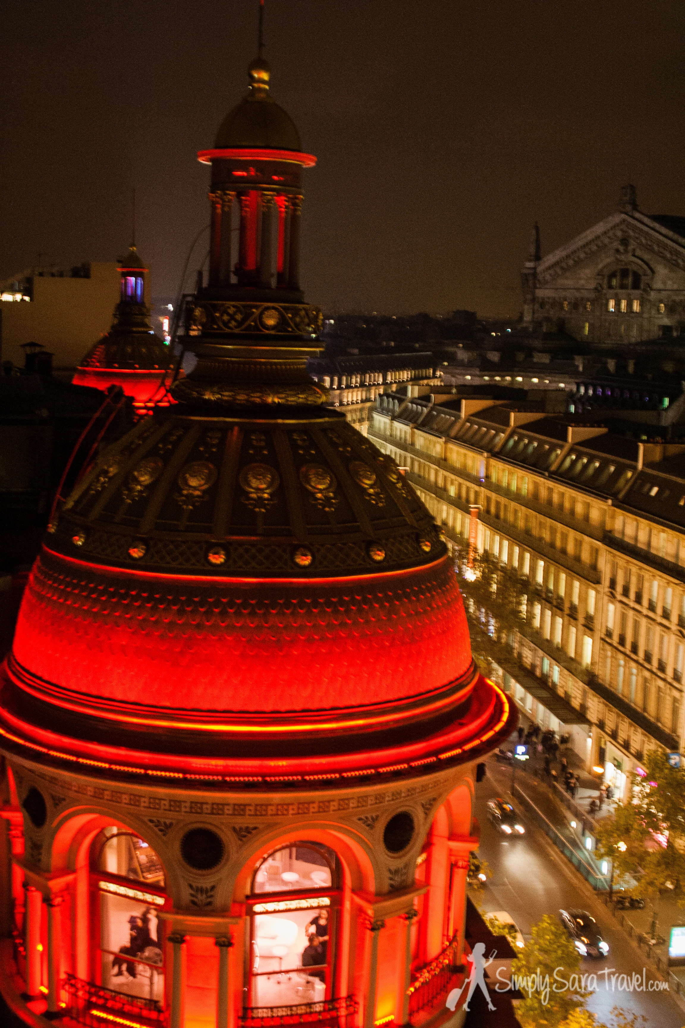 The top of Printemps with Palais Garnier (the opera) in the background