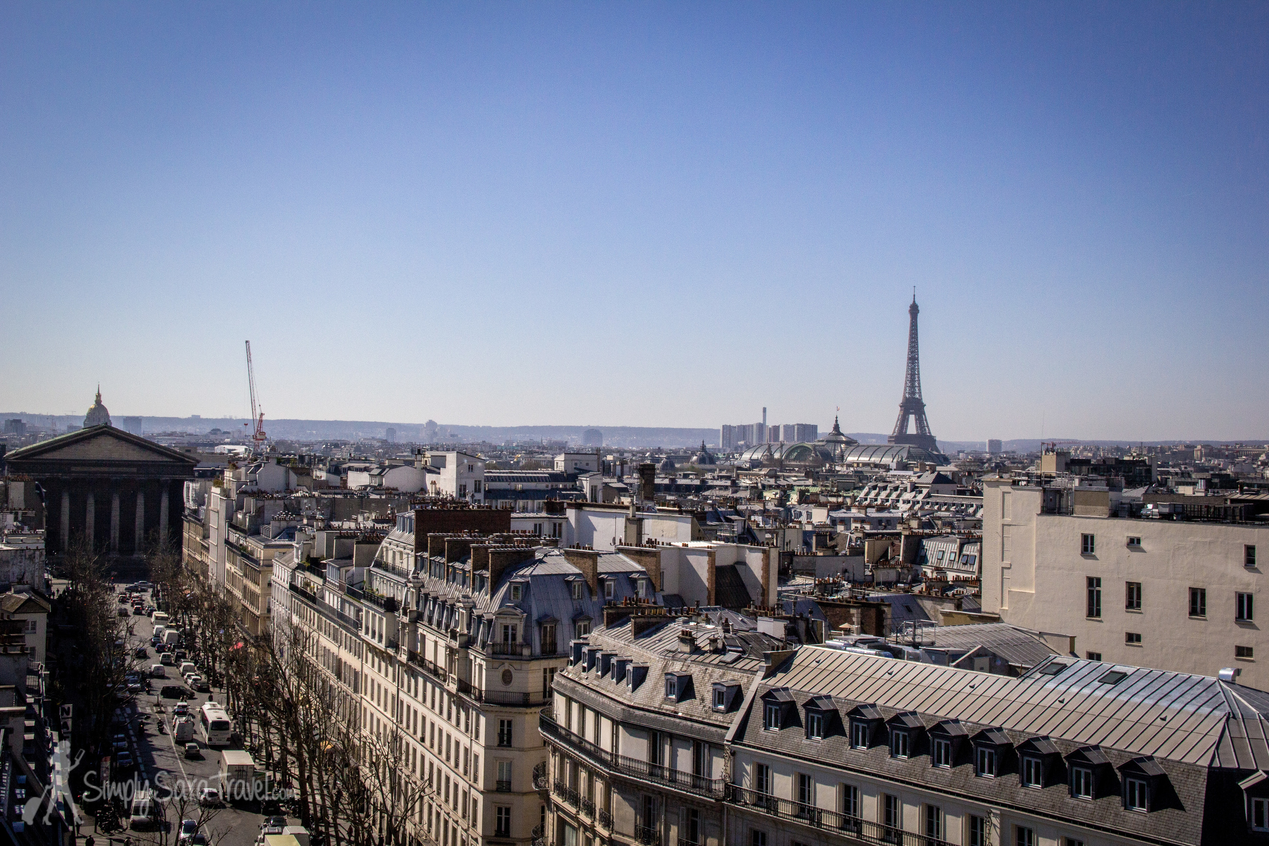 Looking out at La Madeleine church and the Eiffel Tower