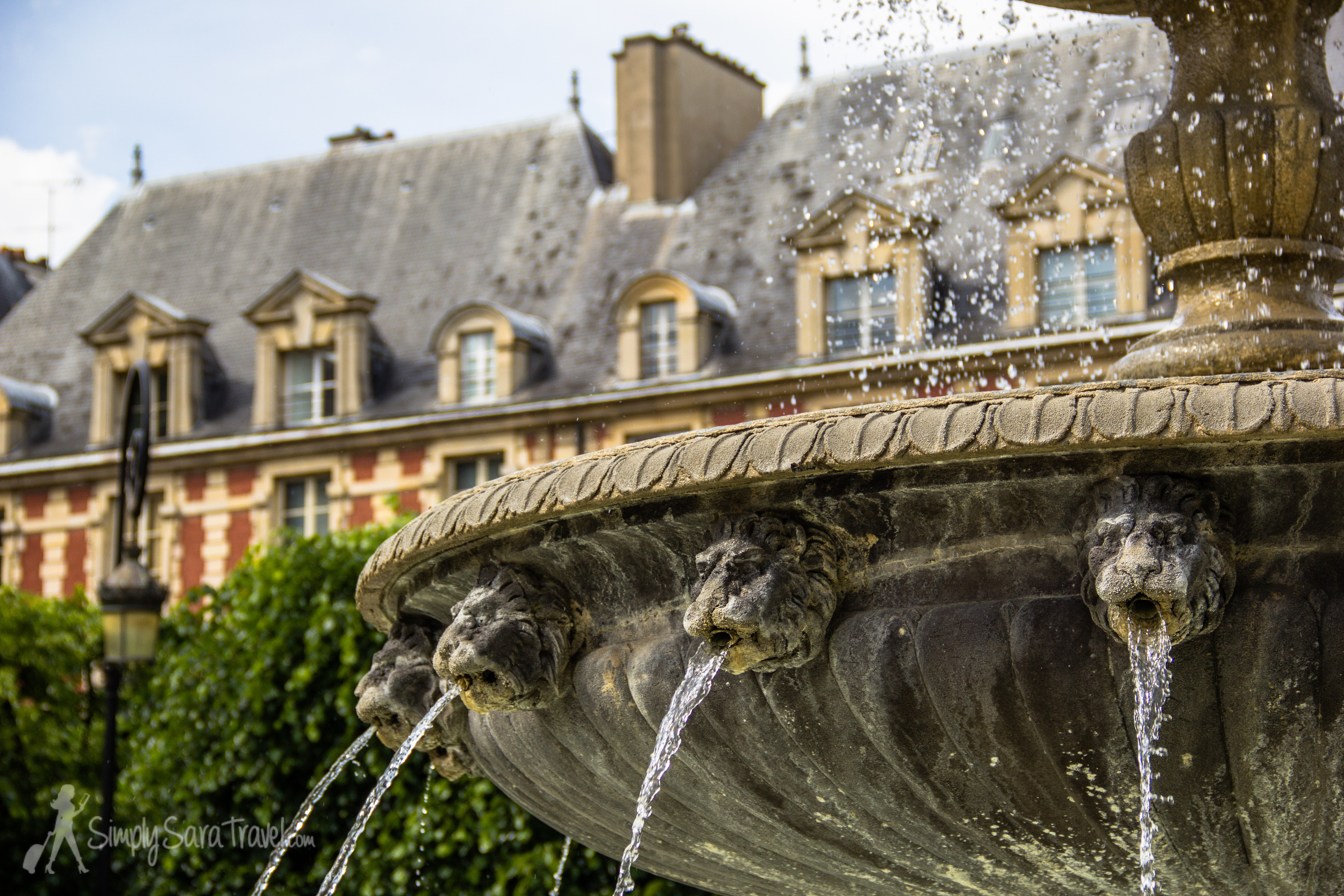 Place des Vosges in the Marais, the oldest planned square in Paris.