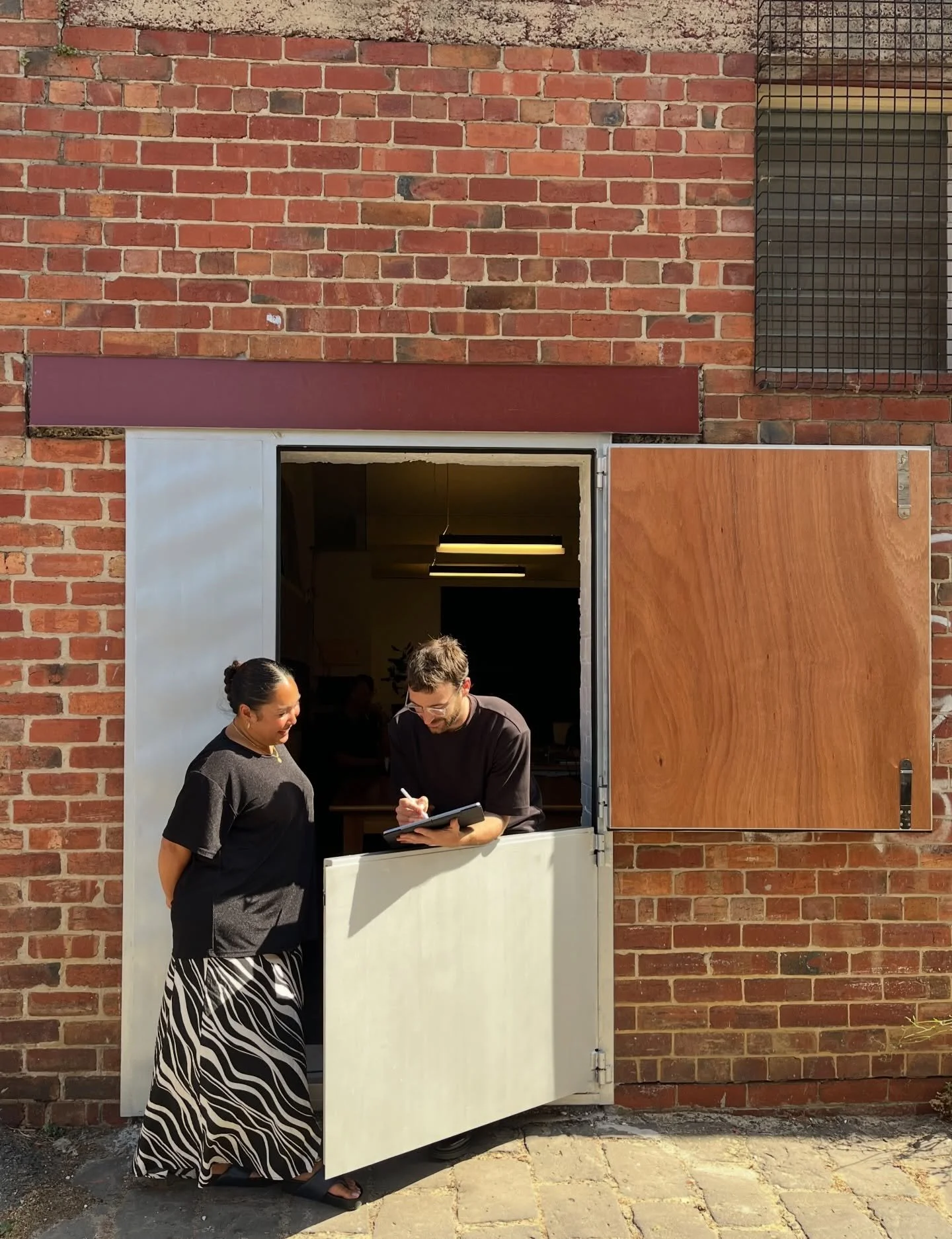 We are back at work in the Old Dairy, welcoming in the New Year with a brand new door! We love spilling out onto our quiet laneway for lunch or casual meetings whilst the warm breeze carries through the workspace and our furry friends are kept safe i