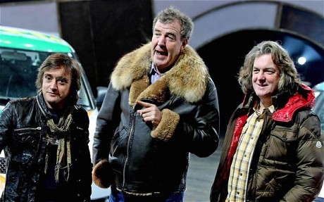 Three middle aged blokes doing bloke things in a bloke manner