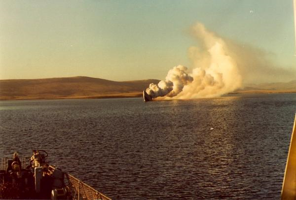 HMS Antelope's bows-up, before the final plunge - viewed from HMS Argonaut.