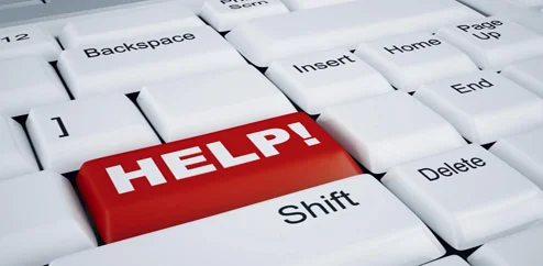 white computer keyboard with the red button help