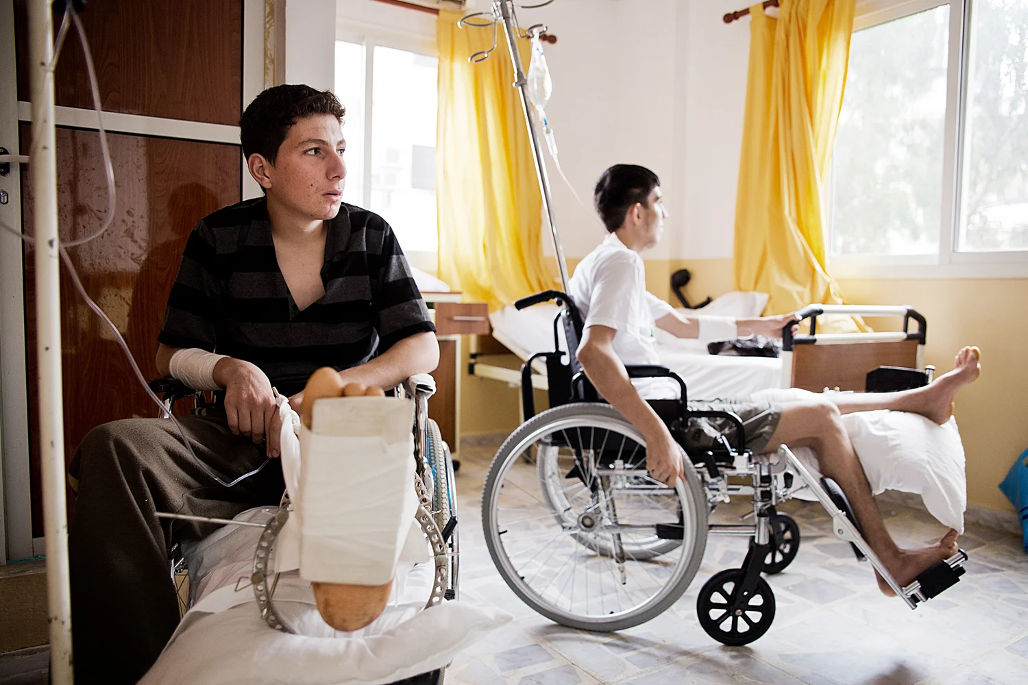  These two brothers, who say they never lifted a finger against anyone, both took shrapnel
during an assault on their hometown, resulting in nearly matching injuries. 






  
  
   
  
  

  
  
   Normal 
   0 
   
   
   
   
   false 
   false 
