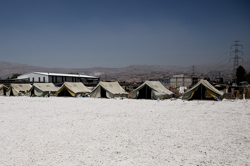  Another camp, the only one I’ve seen with donated tents
uniformly arranged.&nbsp; An aid group also
set up public showers, meaning everyone I saw at this camp was far cleaner than
anyone I’ve seen at any other camp.&nbsp;
(Lebanon doesn’t officially