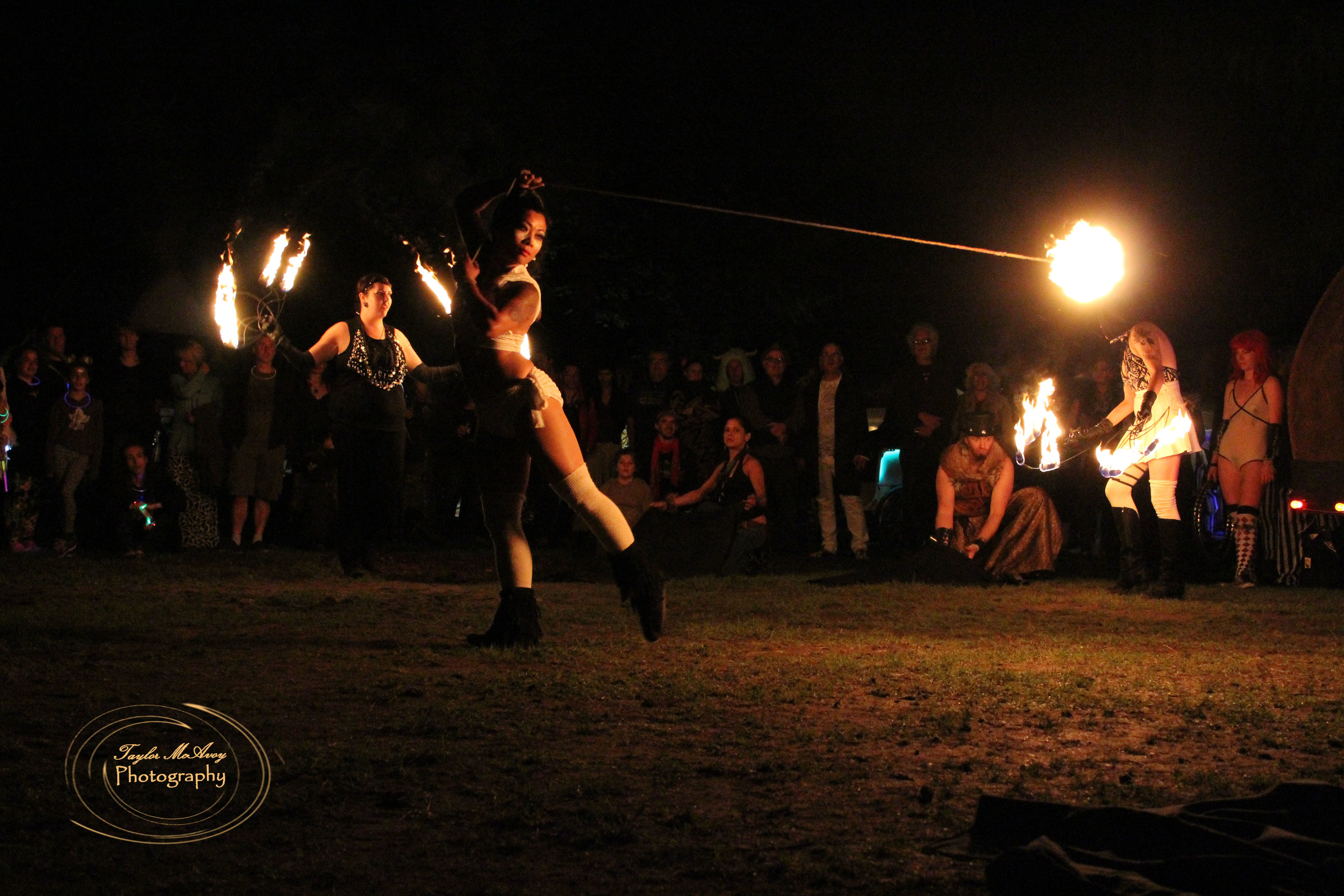  Saleurn Ramos performs her set with others in her troupe preparing to follow. 