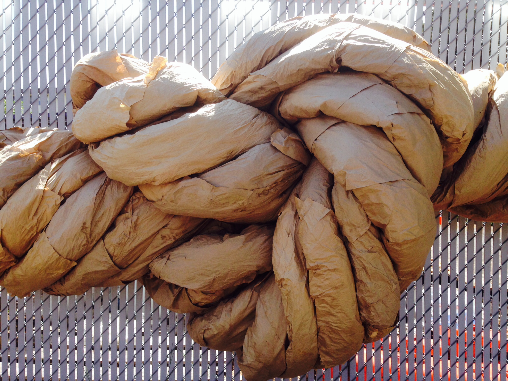 Installation of paper rope art titled "Seven"