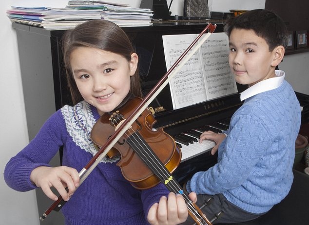 HARD WORKERS: Nathan aged 10 and his sister Natalie, 7.