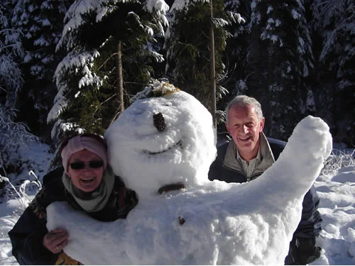 Professor Franz Mathis and his wife Christine with their snowy friend.