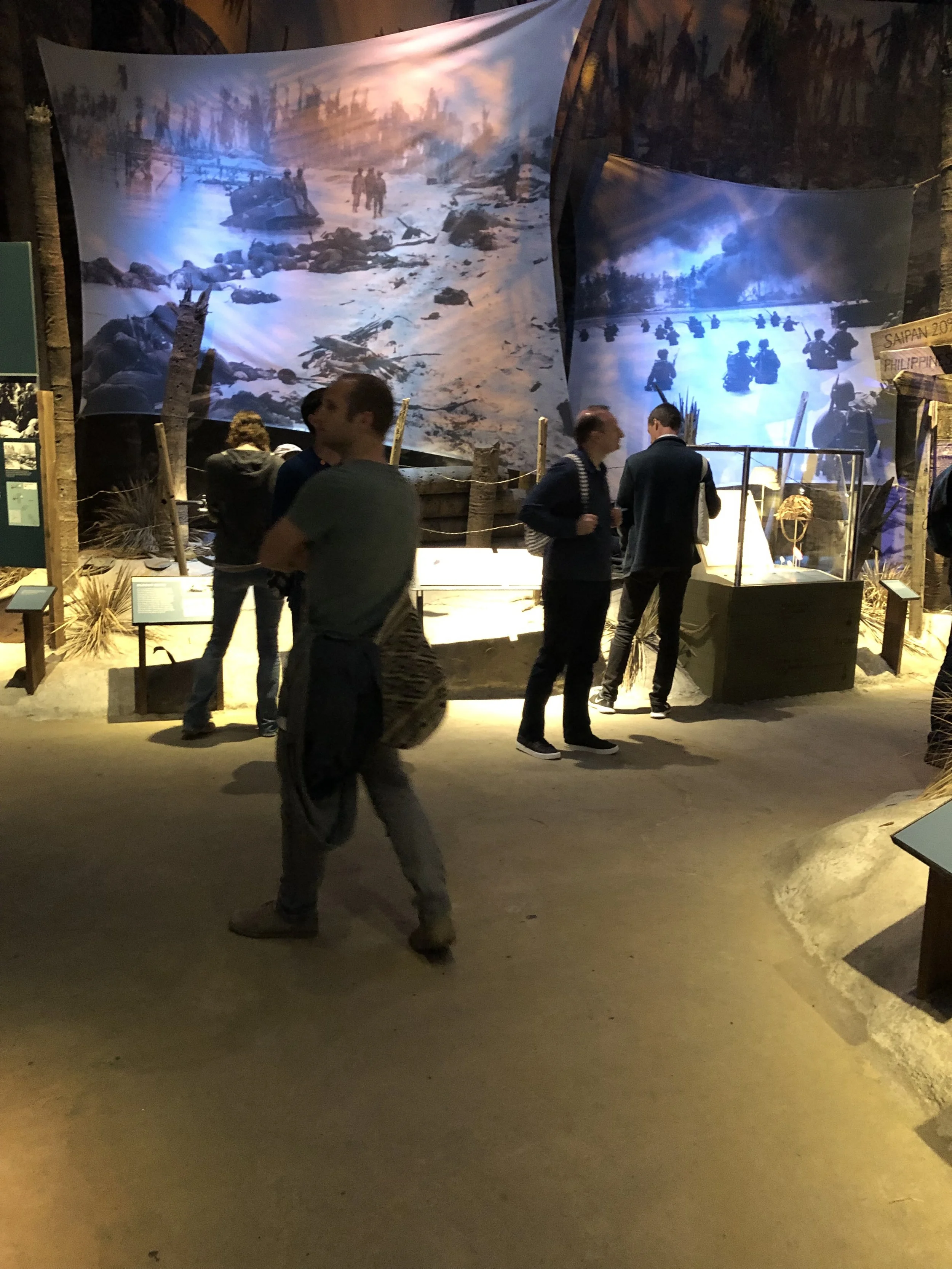 The group touring the exhibits at the National World War II Museum