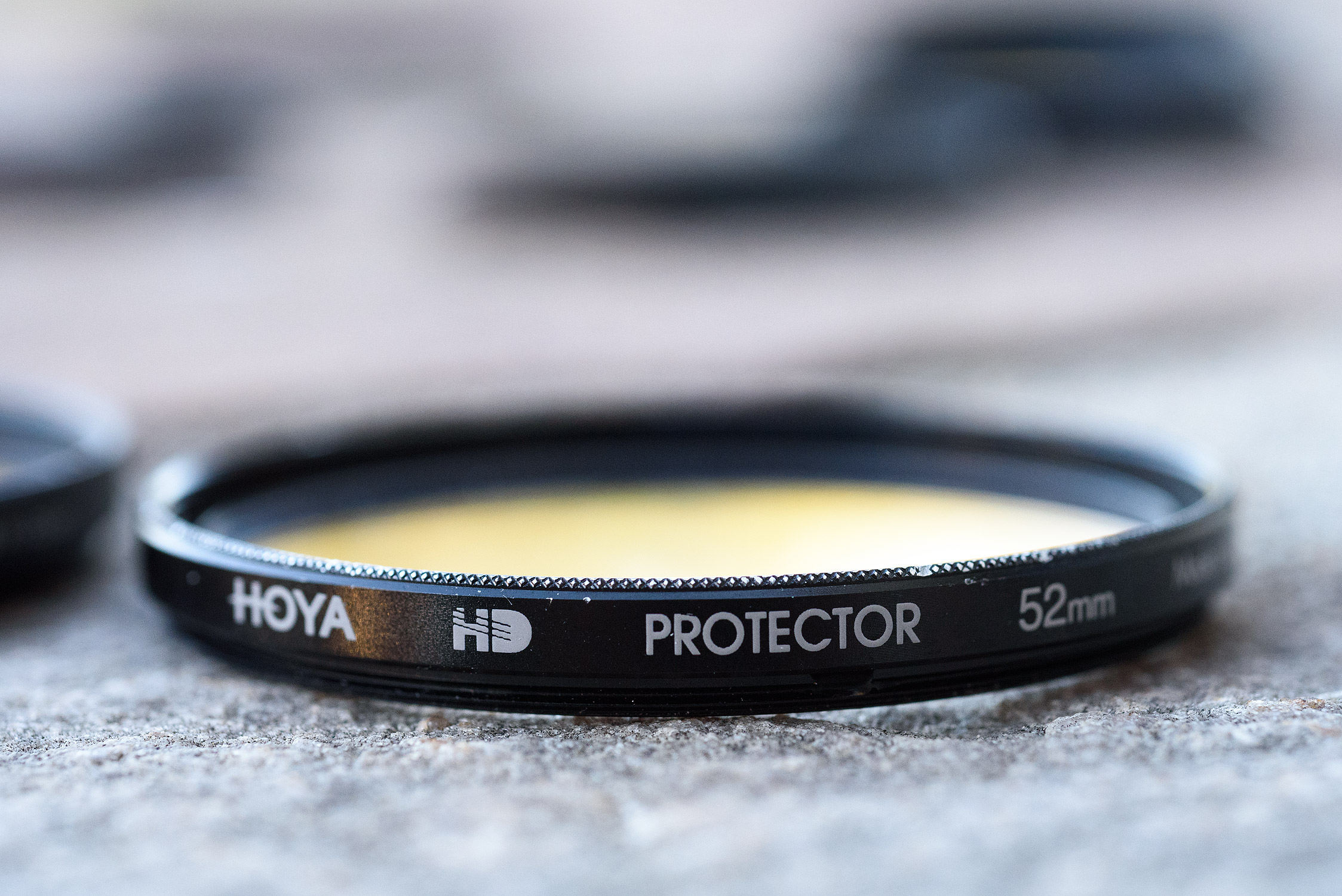 Real Hoya HD. Glossy finish, chamfered edge.