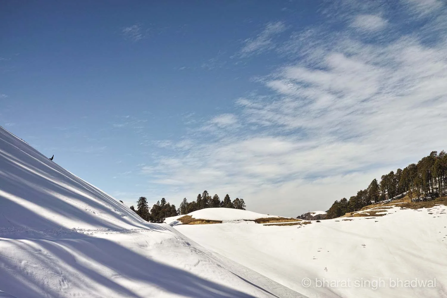 Last overhanging snow drift.