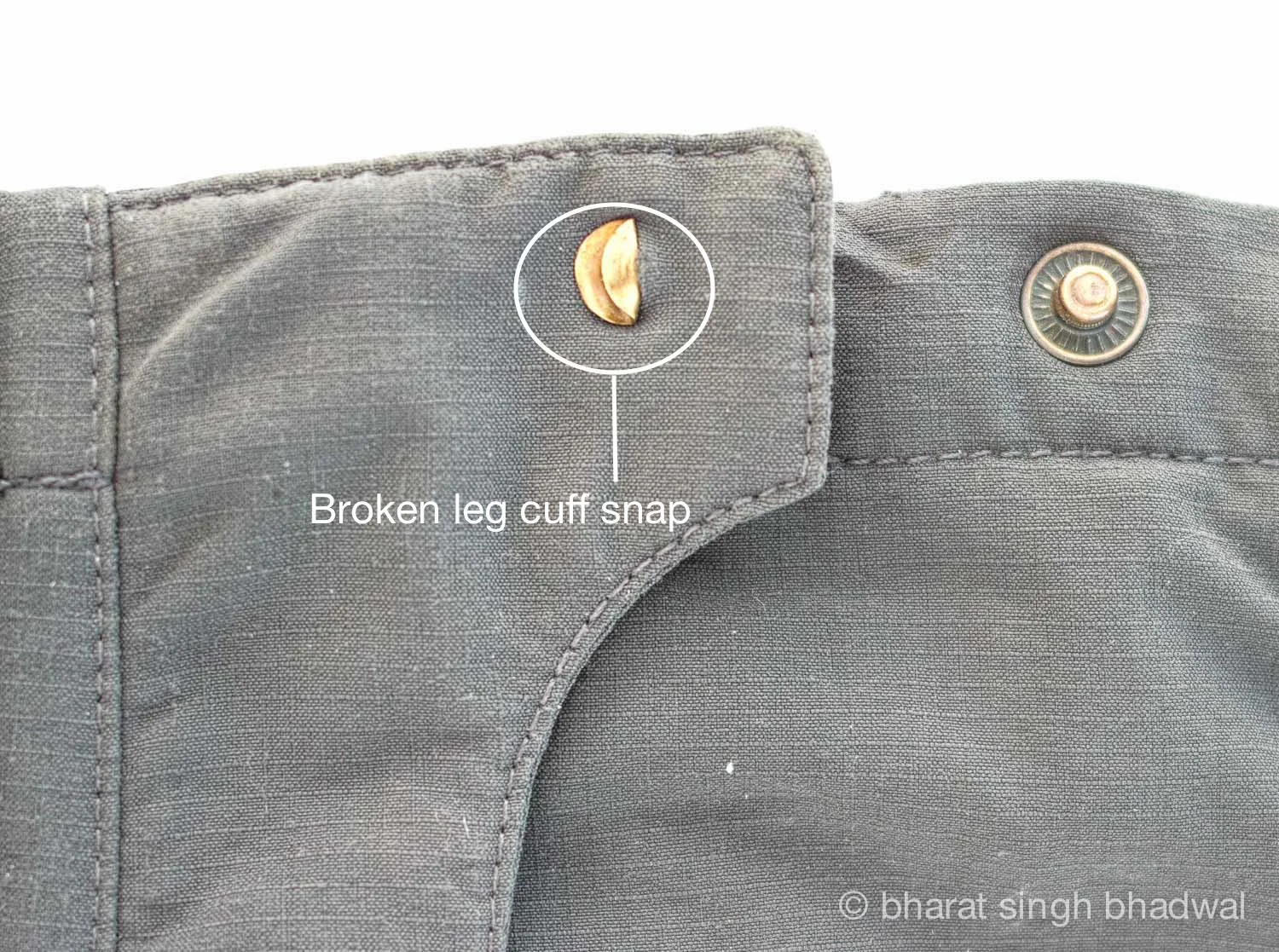 Leg cuff snap broken, probably as a result of slipping below the heel when walking barefoot